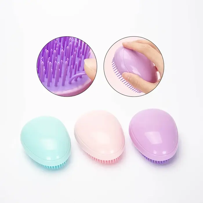 Mini brosse à cheveux ronde en forme d'œuf