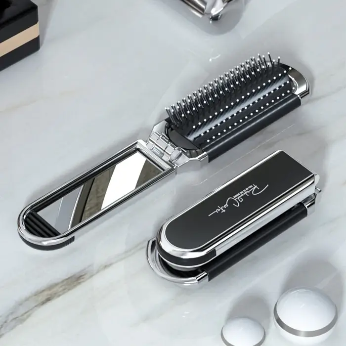 Mini brosse à cheveux pliante