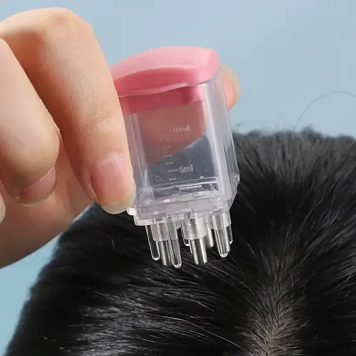 Applicateur de minoxidil pour le cuir chevelu
