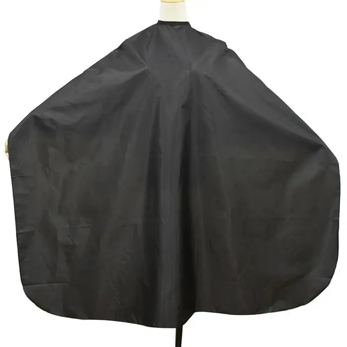 Cape de coiffure noire antistatique à col boutonné pour salon