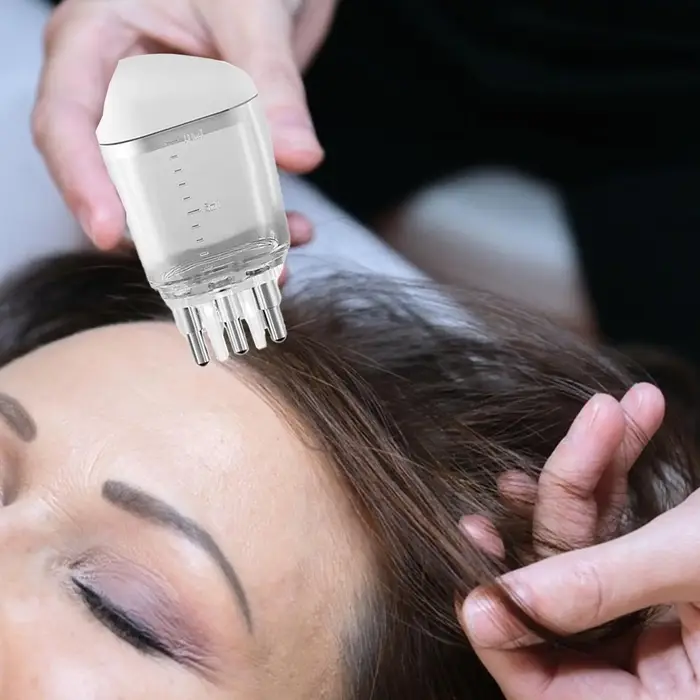 Applicateur de soin capillaire