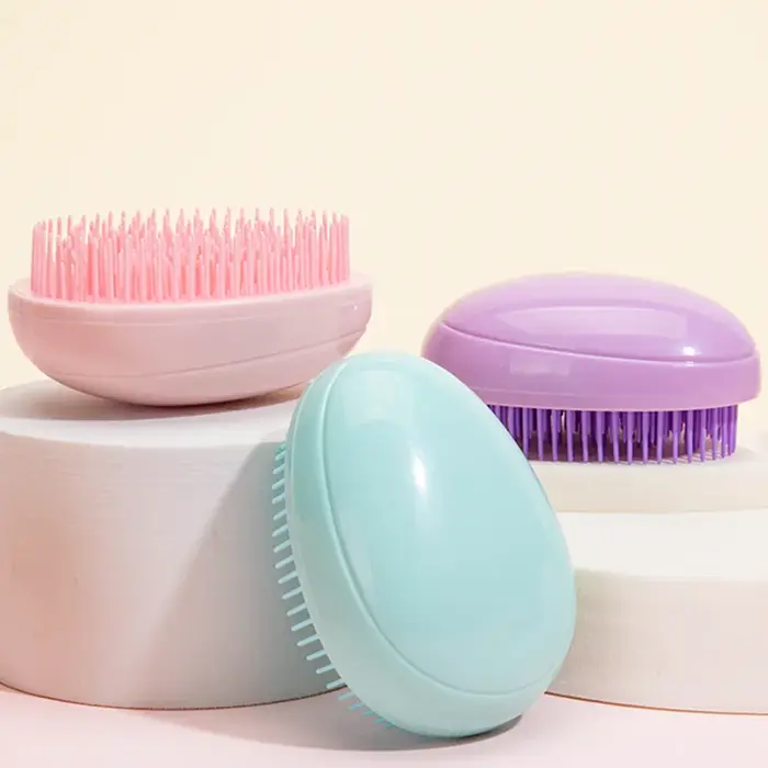 Mini brosse à cheveux ronde en forme d'œuf
