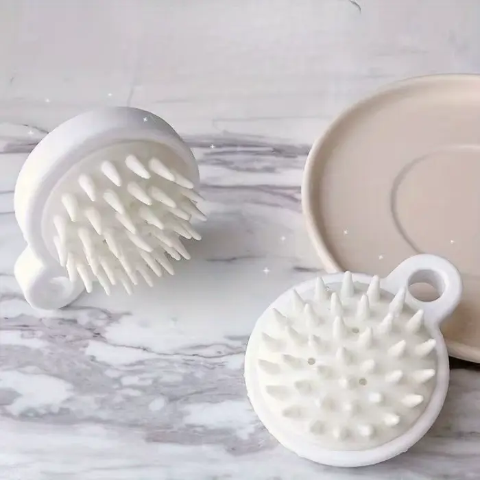 Brosse de massage du cuir chevelu
