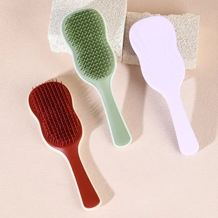 Brosse à cheveux anti-poignées