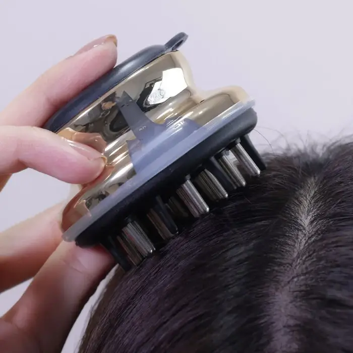 Applicateur de cuir chevelu