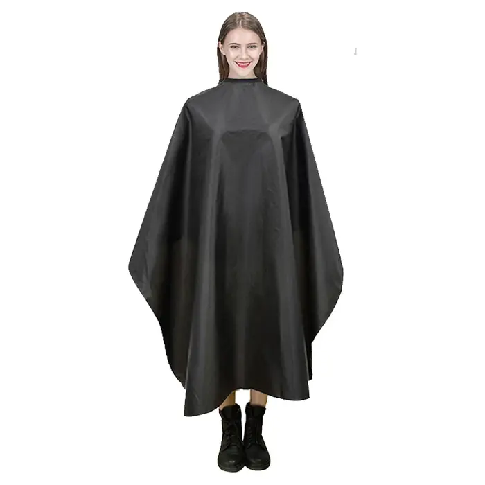 Cape de coiffure noire antistatique à col boutonné pour salon
