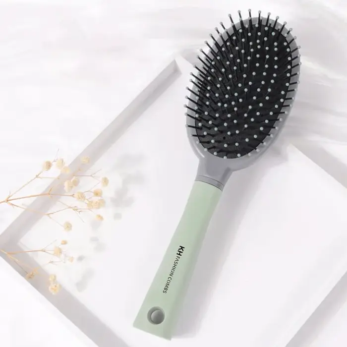 Brosse à cheveux démêlante pour cheveux ondulés/bouclés