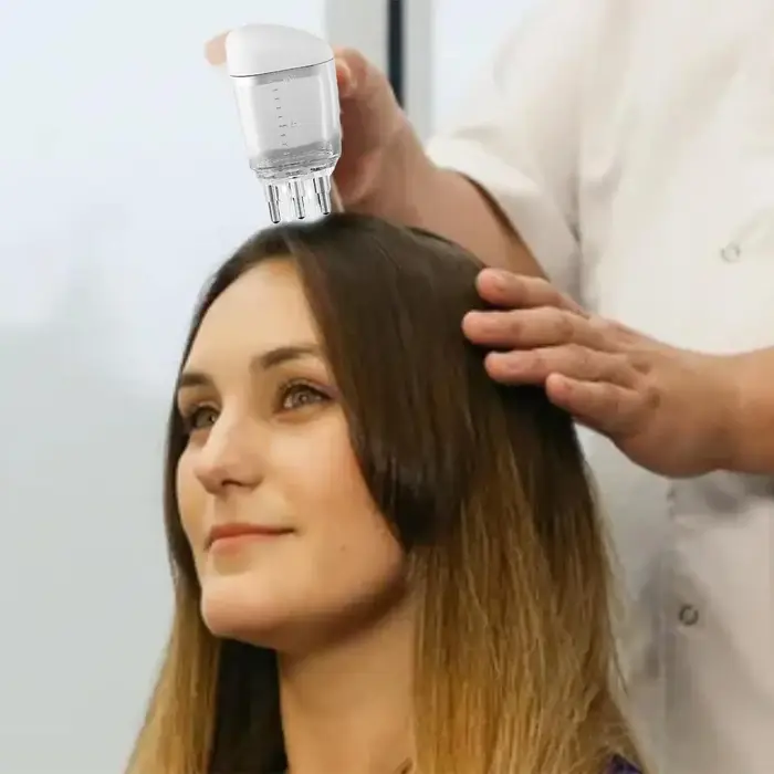 Applicateur de soin capillaire
