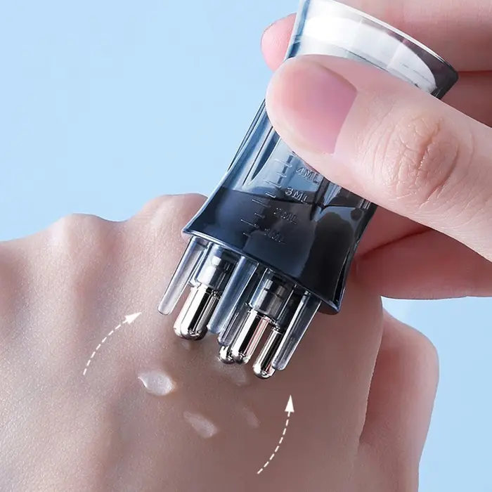 Peigne liquide applicateur de cuir chevelu
