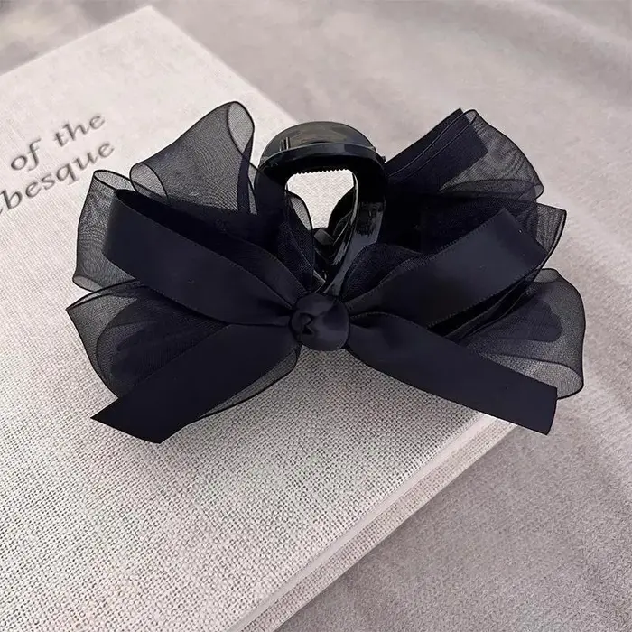 Pince à cheveux avec nœud en maille noire ultra-fantasy